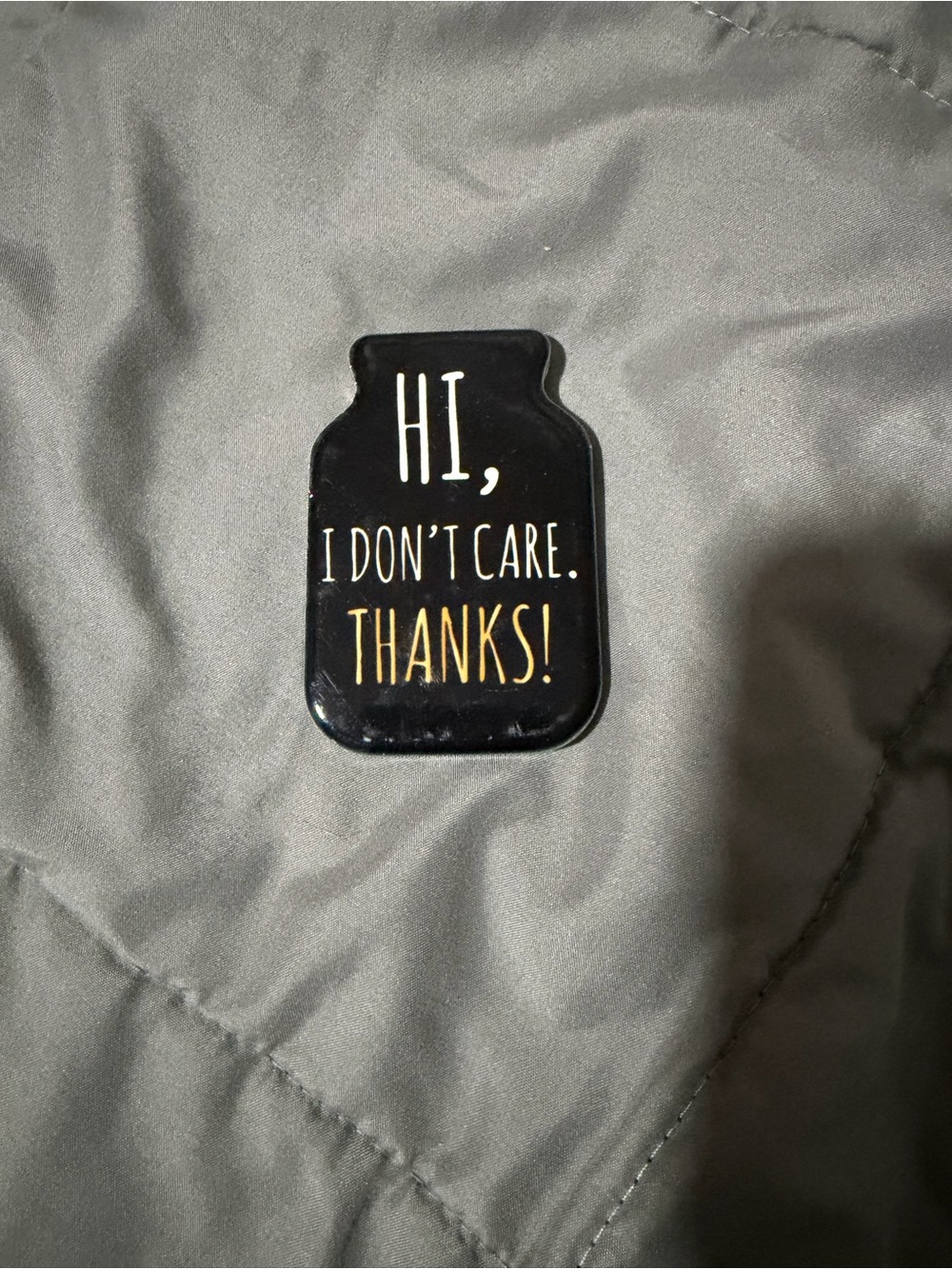 Black Novelty Phone Grip with 'Hi, I Don't Care. Thanks!' Text